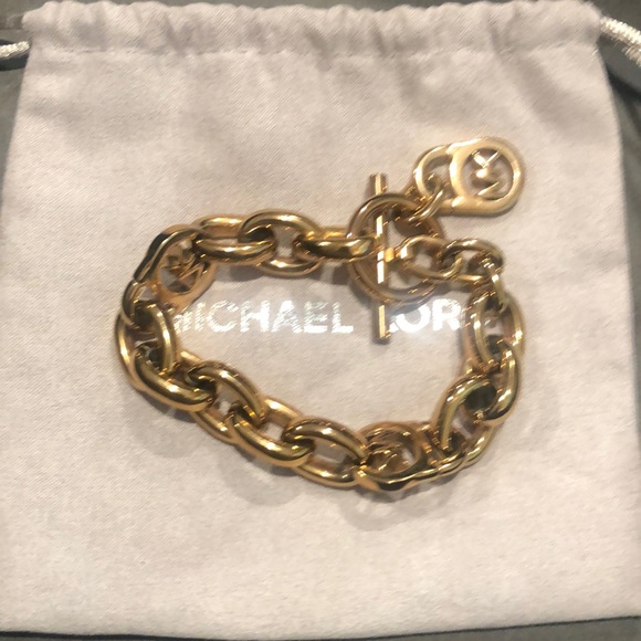 Michael Kors Jewelry - Michael Kors Logo Toggle bracelet in Rose Gold.